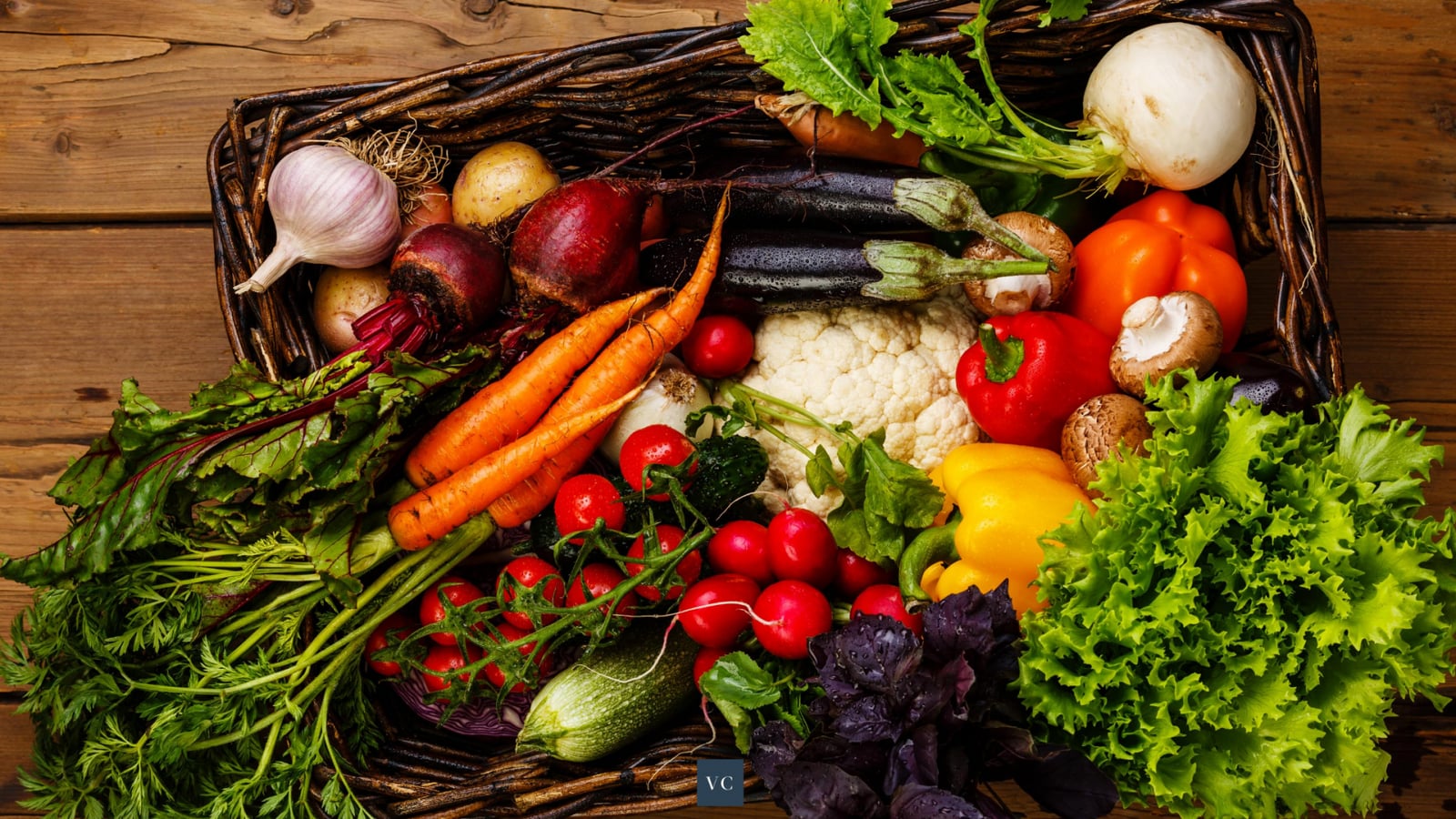 A selection of fresh vegetables on a wooden table