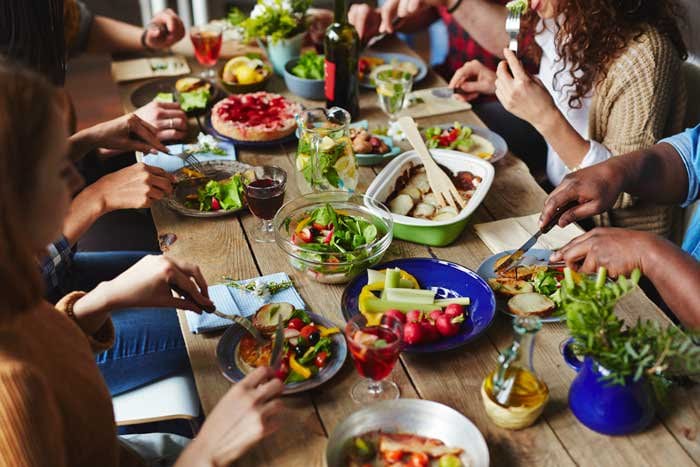 Friends sharing a meal around a table