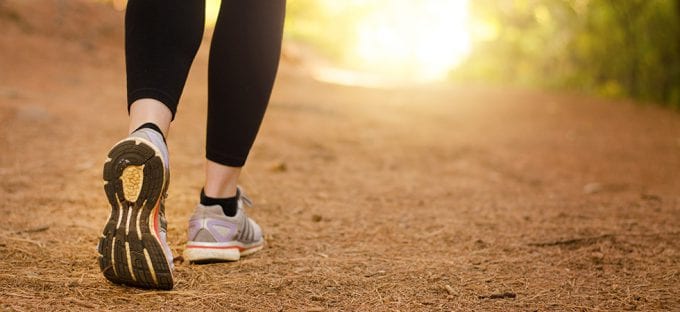 A person running along a path
